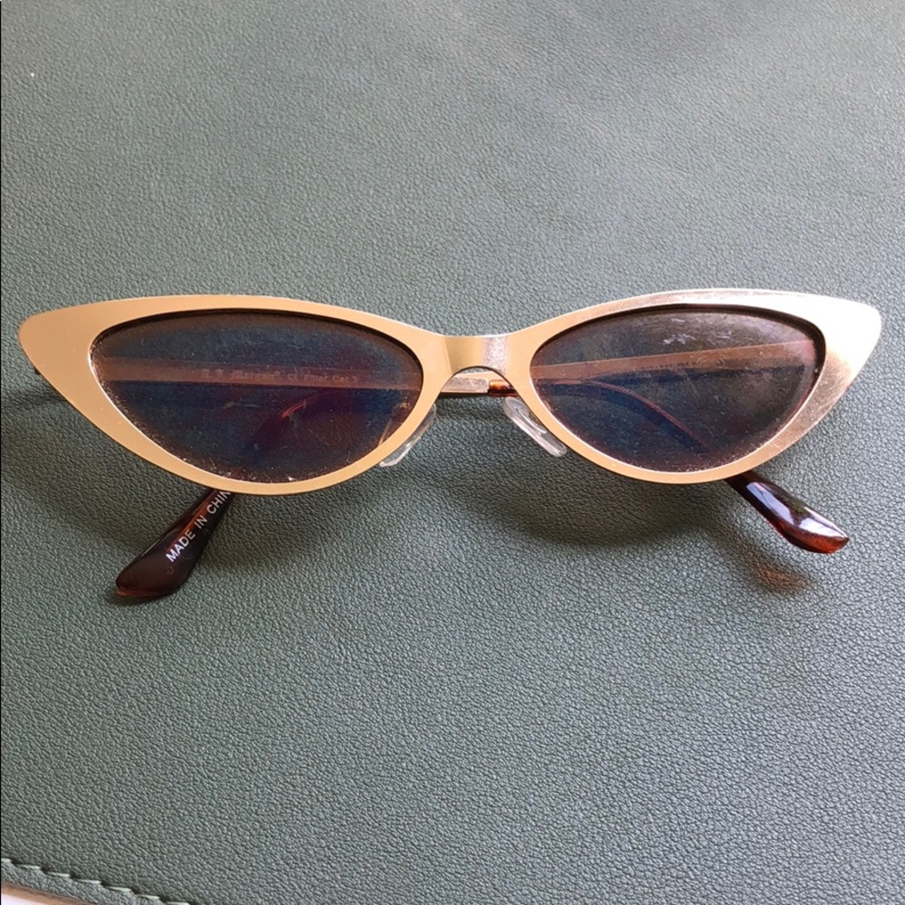 Gold rim sunglasses